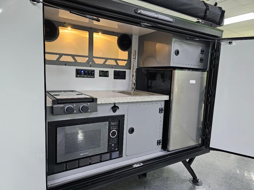 Encore RV outdoor kitchen with Graystone products