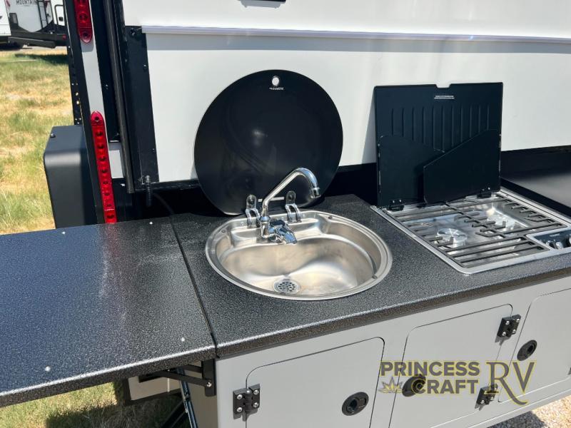 Kitchen with aluminum sink and 2 burner cooktop